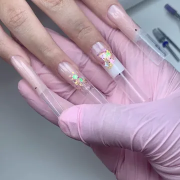 Unhas longas nude com encapsulada, feitas por aluna do Curso VIP